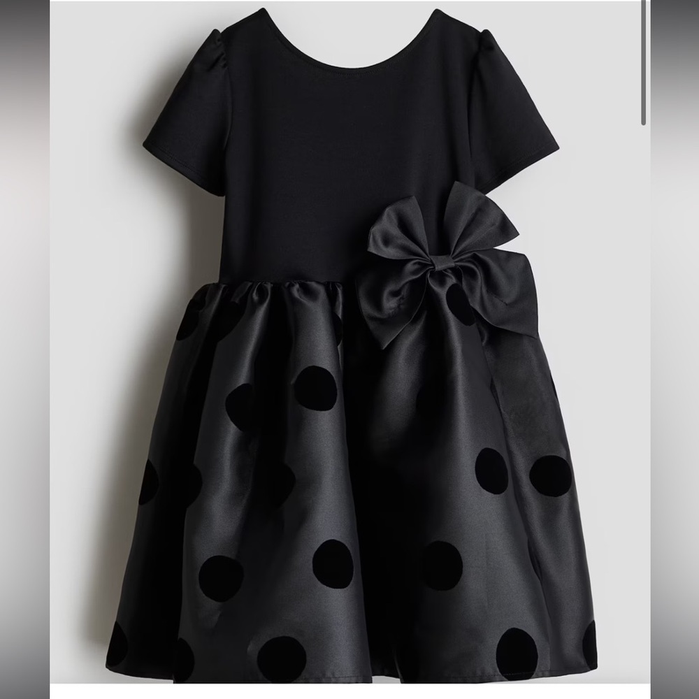 Polka dotted bow dress